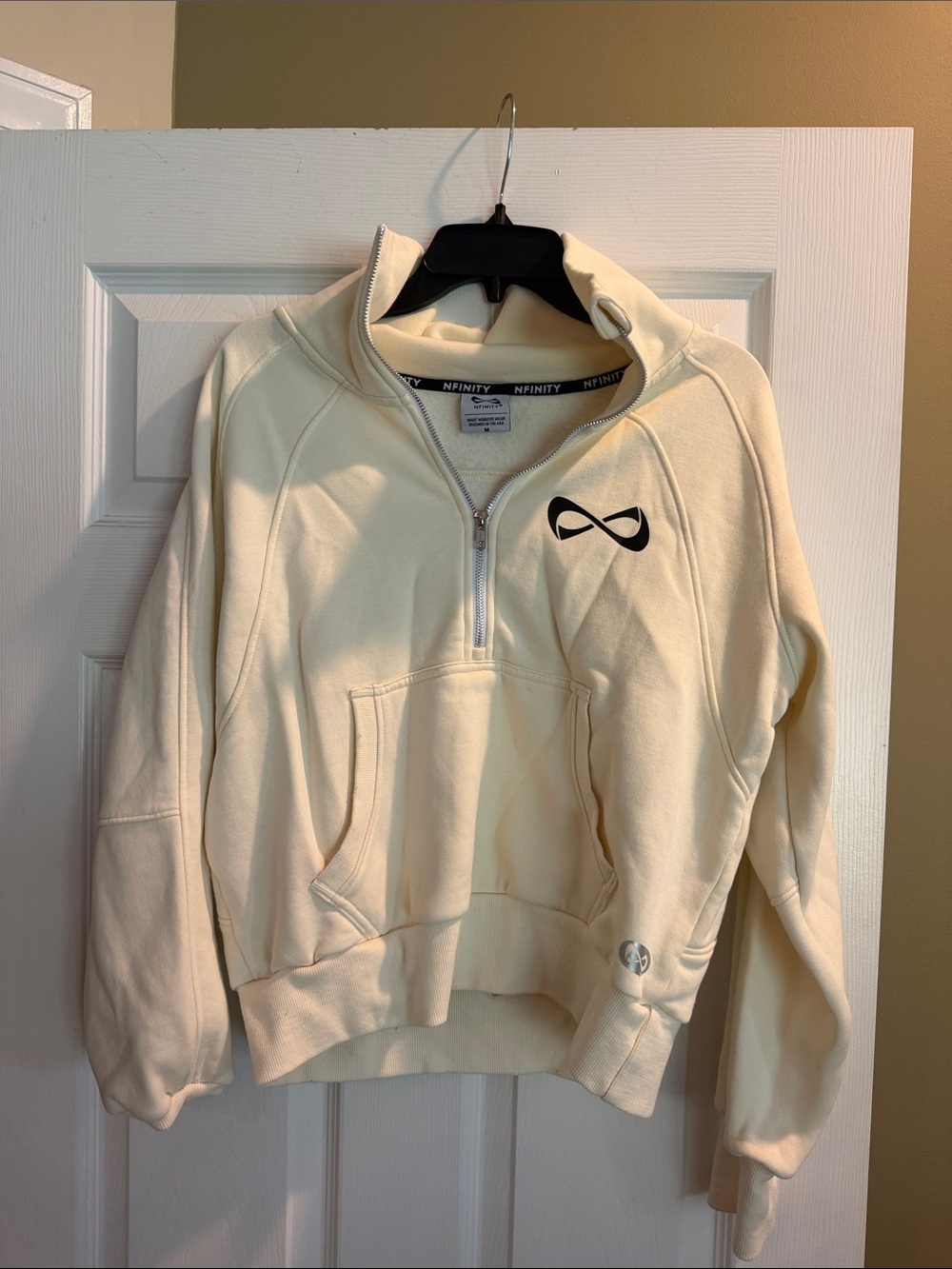 NFINITY Cream Half-Zip Pullover with Black Logo Trim